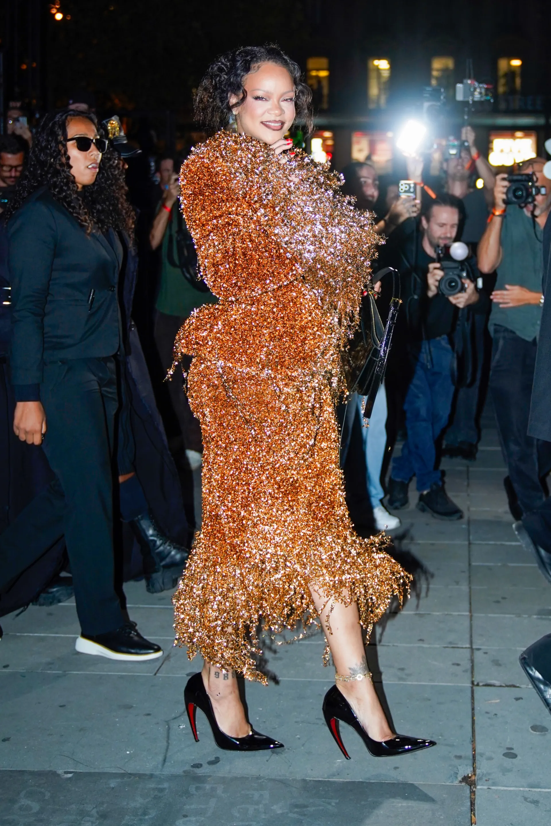 Rihanna Stuns at Paris Fashion Week in Bold Matières Fécales Look