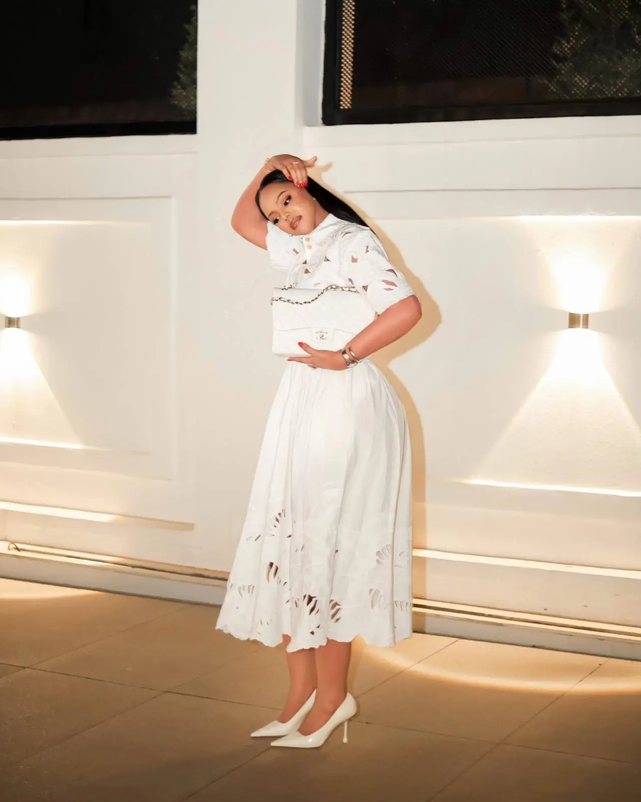Jolly Mutesi’s Designer Look Features Five Luxury Fashion Brands